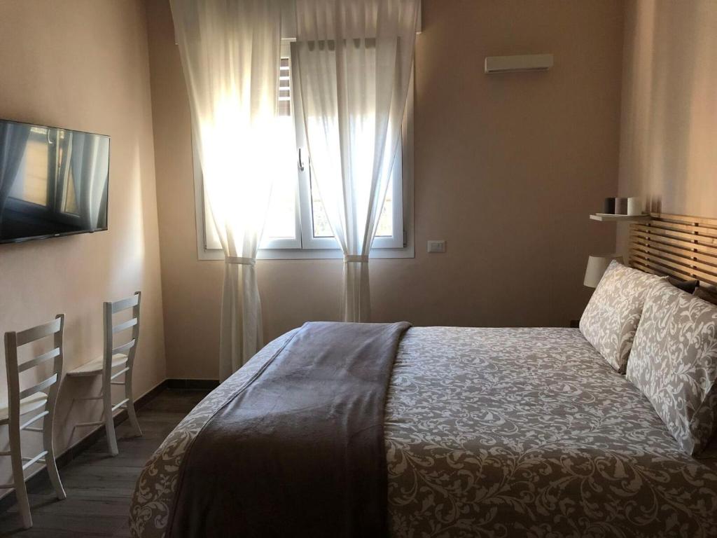 Postel nebo postele na pokoji v ubytování Hayloft