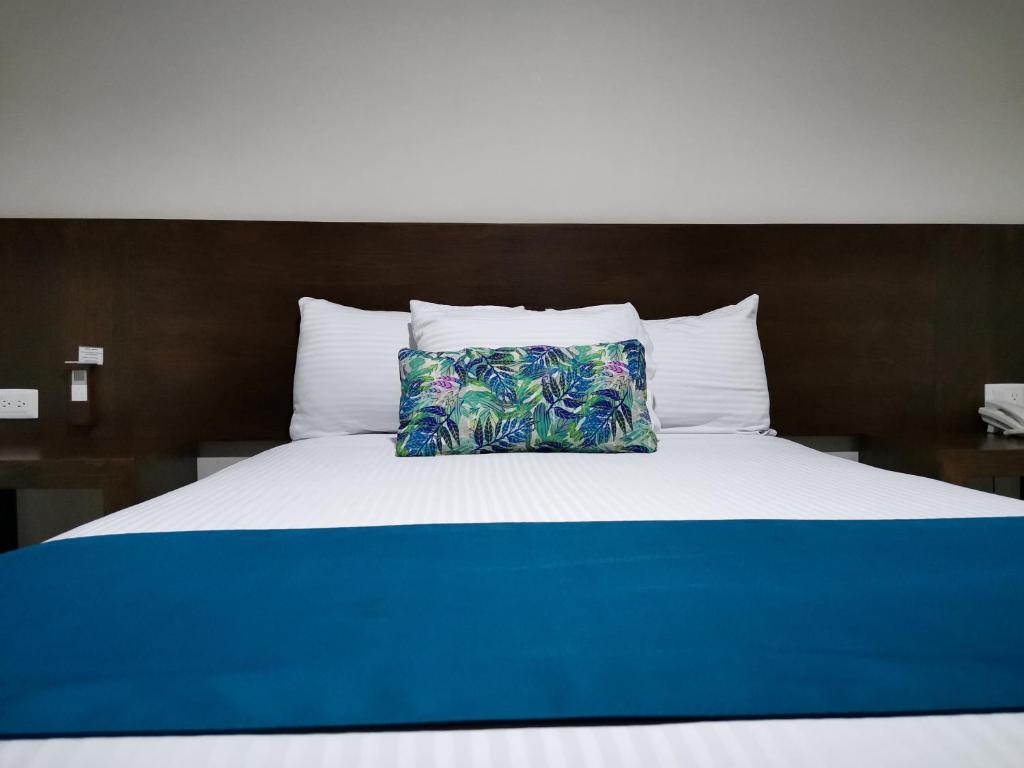 Postel nebo postele na pokoji v ubytování Hotel Pabela