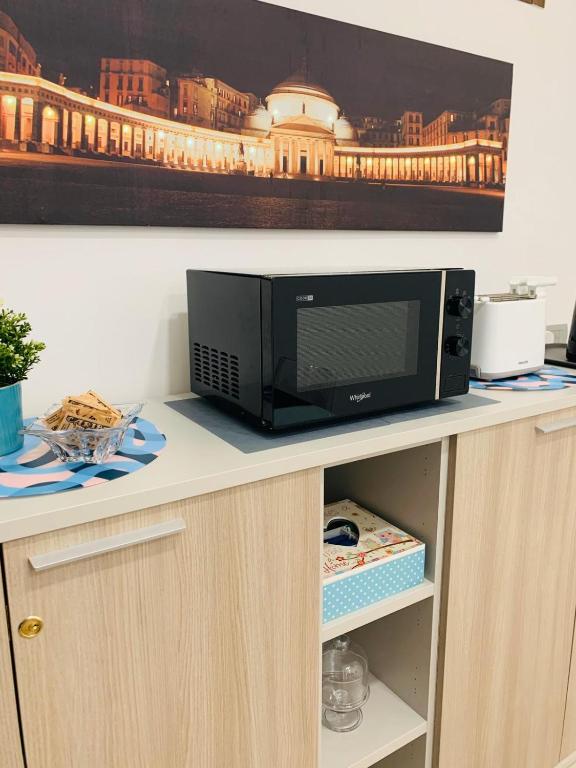 Telewizja i/lub zestaw kina domowego w obiekcie B&B Nonna Franca