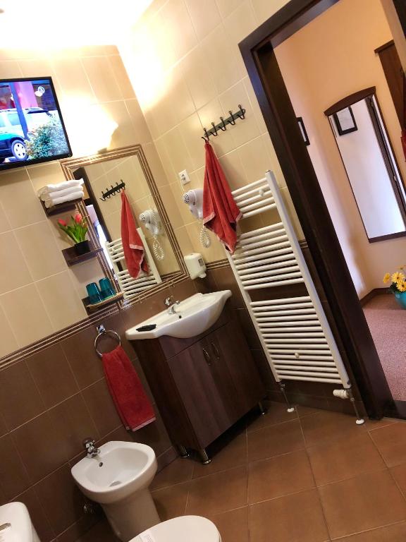 Koupelna v ubytování Ambrózia Étterem és Panzió