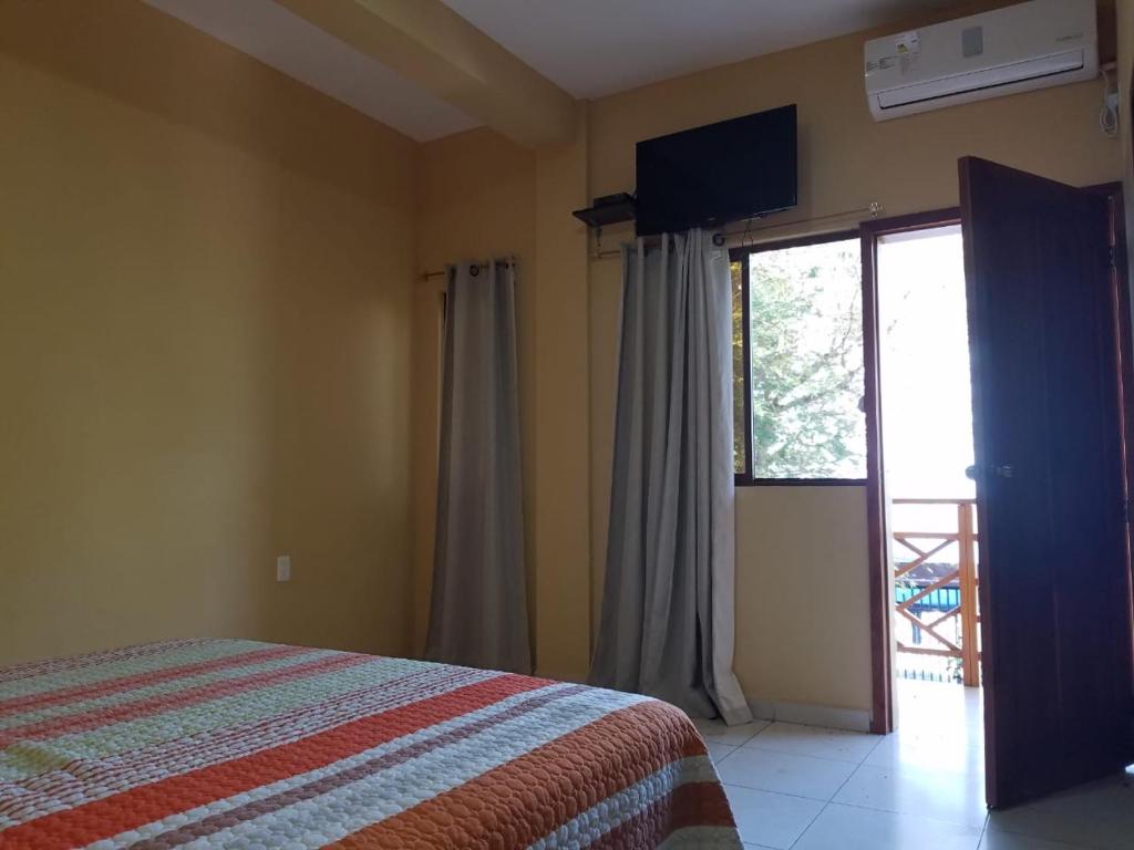 Postel nebo postele na pokoji v ubytování Hotel Soberao