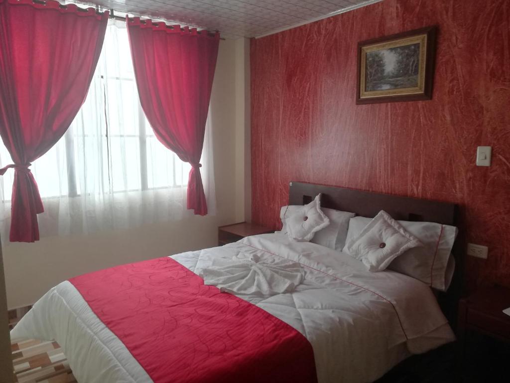 Postel nebo postele na pokoji v ubytování Hotel Gun Glub