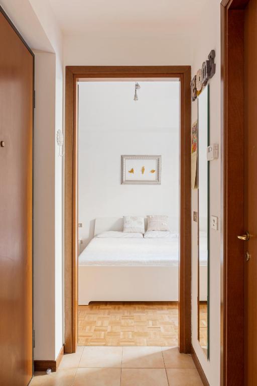 Posteľ alebo postele v izbe v ubytovaní Comfy Apartment in Corso Como