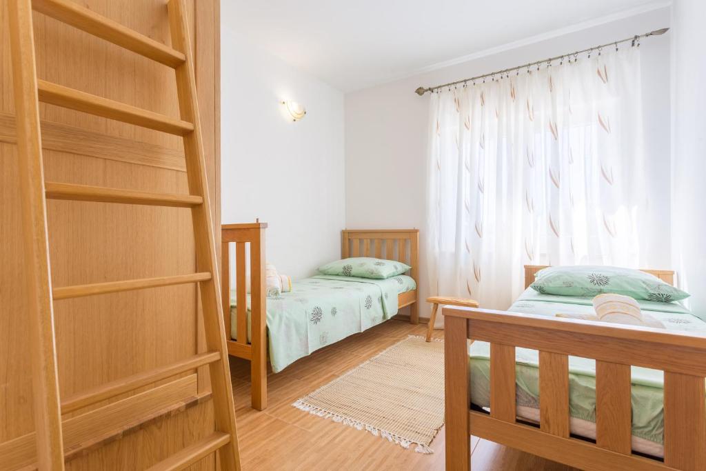 Posteľ alebo postele v izbe v ubytovaní Vila Milančić - a house for memorable holiday in Imotski