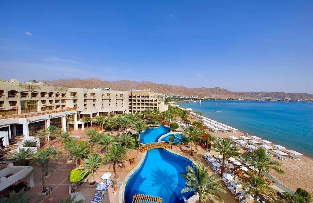 a hotel room with a beach view at InterContinental Aqaba, an IHG Hotel in Aqaba