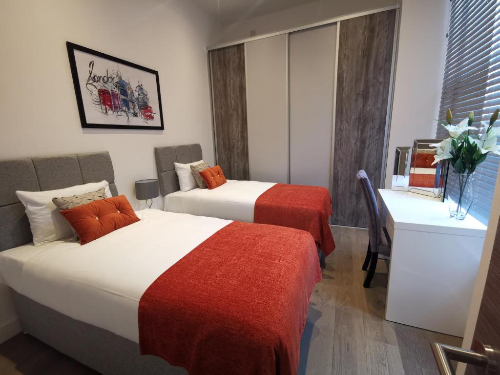 Postel nebo postele na pokoji v ubytování City Prime Apartments