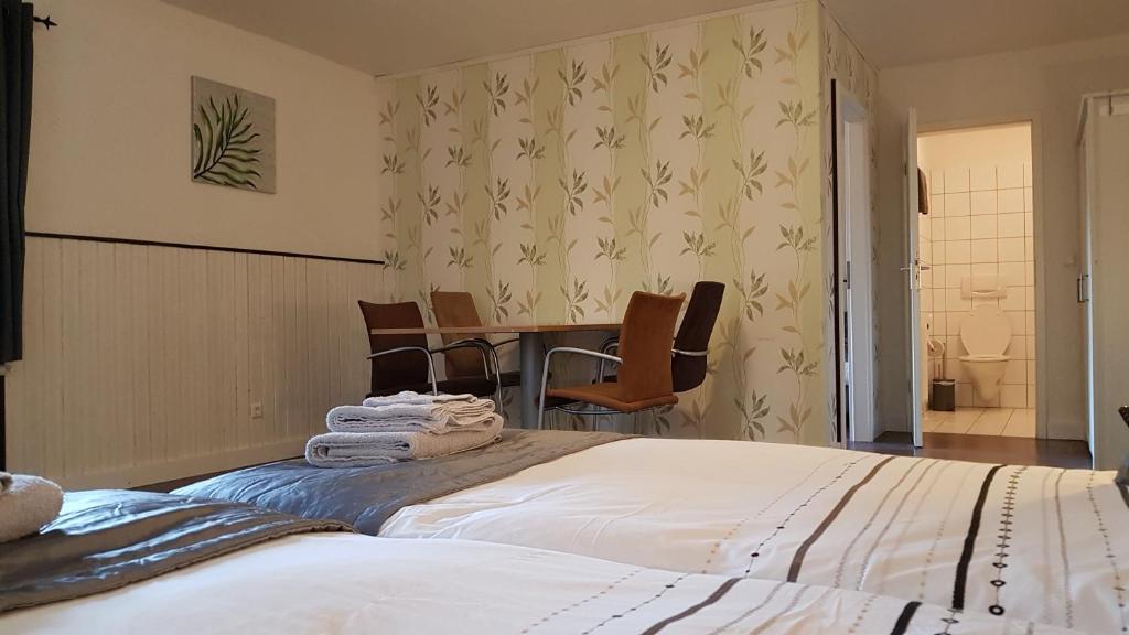 Postel nebo postele na pokoji v ubytování Am Glenne