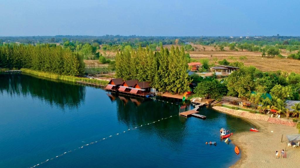 an aerial view of a river with a resort at Tara Beach Resort Udonthani in Udon Thani