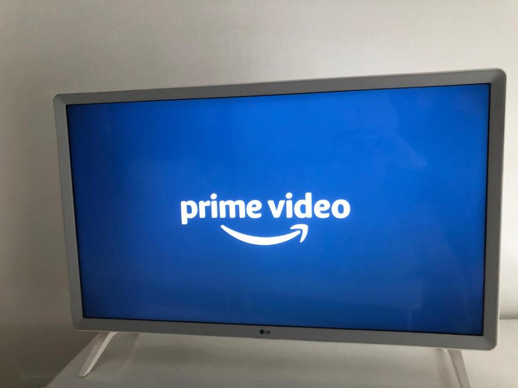 A television and/or entertainment centre at Piano B Apartment