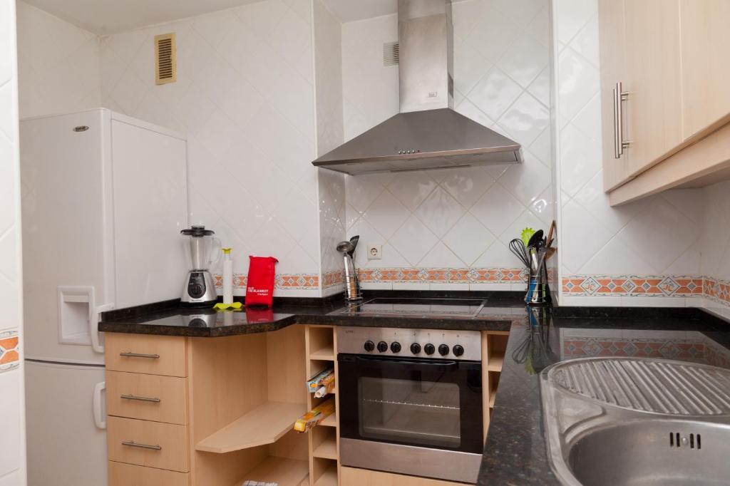 Kuchyň nebo kuchyňský kout v ubytování Apartment LORNA
