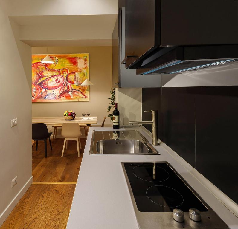A kitchen or kitchenette at Tula Inn