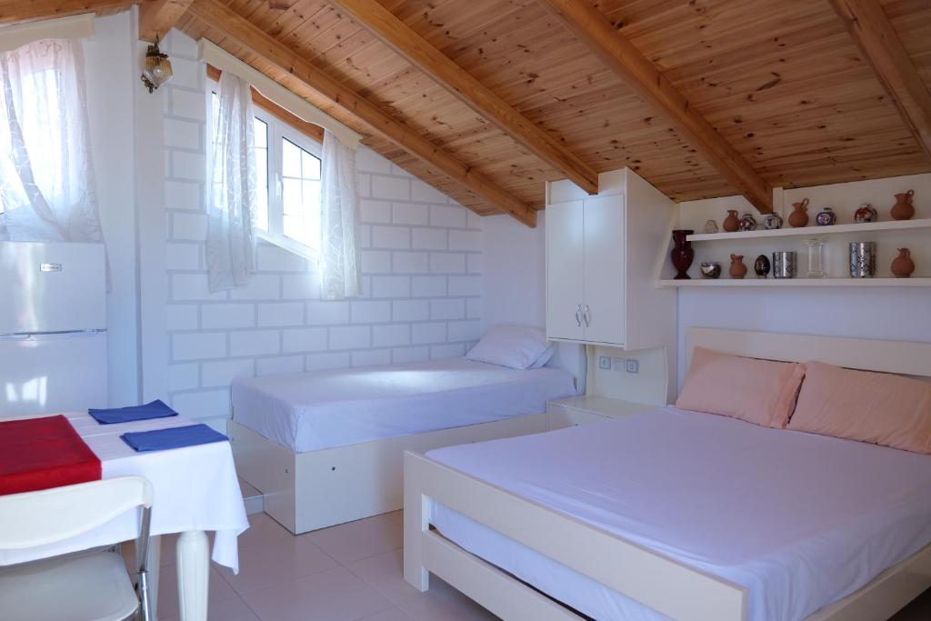Postel nebo postele na pokoji v ubytování Villa Klea
