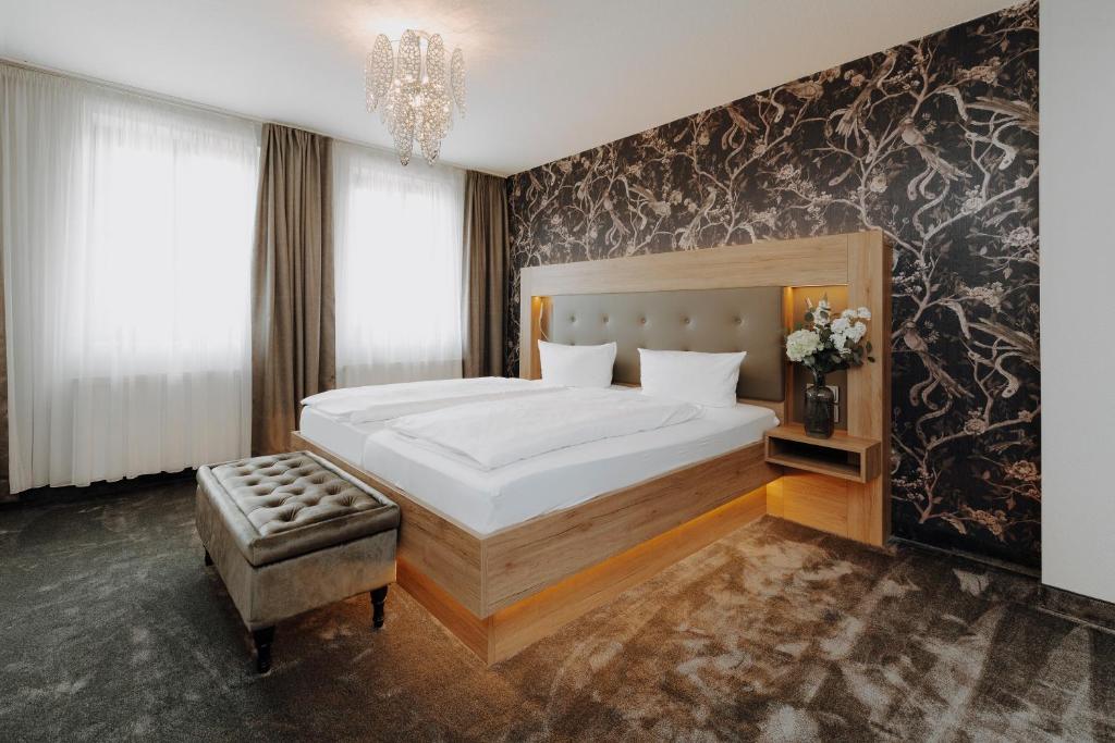 Katil atau katil-katil dalam bilik di Hotel Schwarzer Adler Stendal