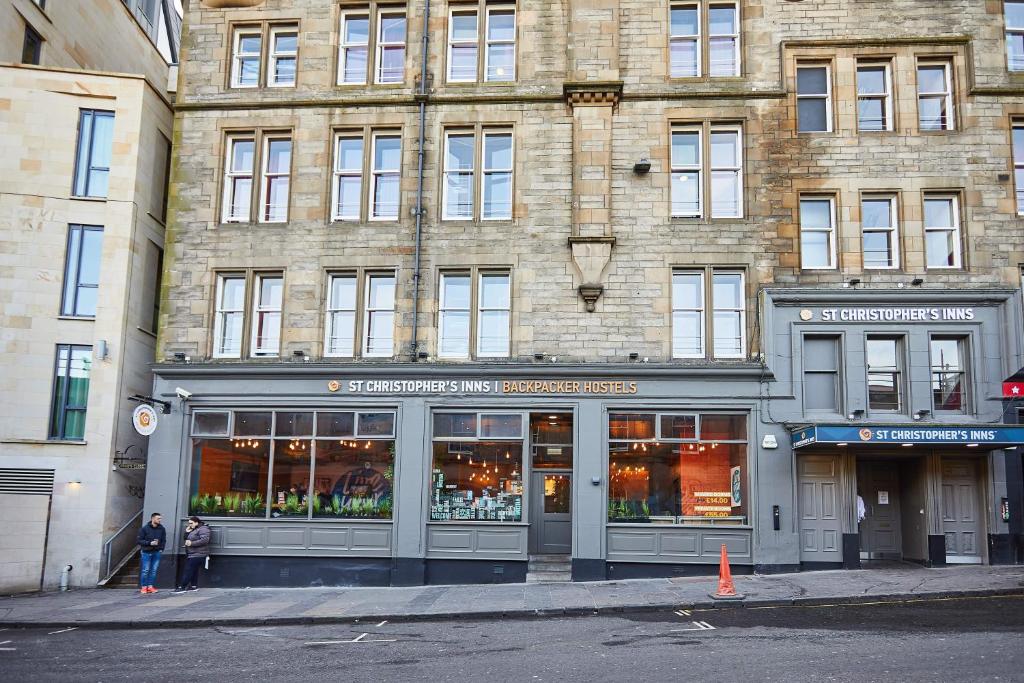 a store front of a building on a city street at St Christopher's Edinburgh Original in Edinburgh