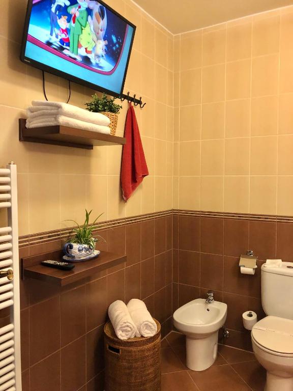 Koupelna v ubytování Ambrózia Étterem és Panzió