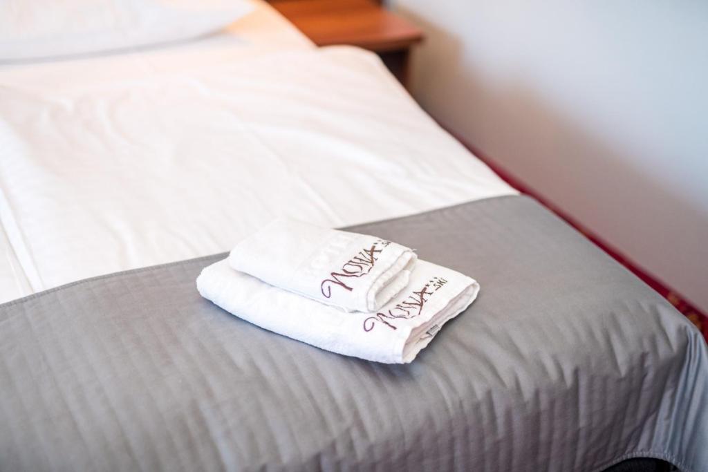 Posteľ alebo postele v izbe v ubytovaní Nowa - Ski SPA Hotel
