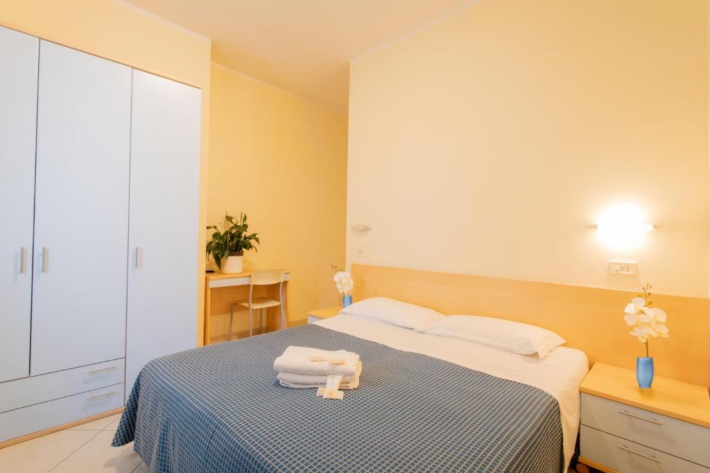 Postel nebo postele na pokoji v ubytování Hotel Fantasy