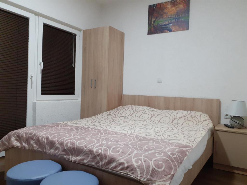Postel nebo postele na pokoji v ubytování Apartments Filemi