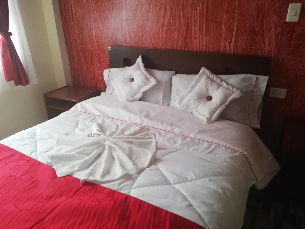Postel nebo postele na pokoji v ubytování Hotel Gun Glub