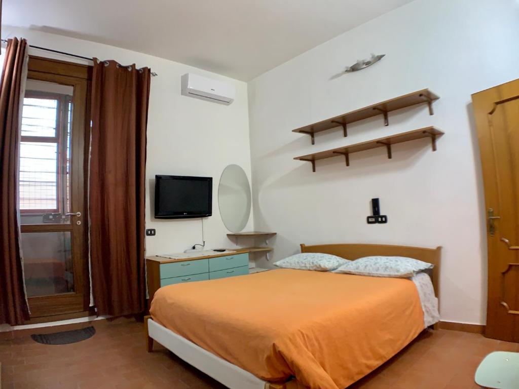 Postel nebo postele na pokoji v ubytování B&B Barone