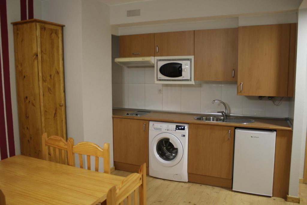 Kuchyň nebo kuchyňský kout v ubytování Apartamento Viman