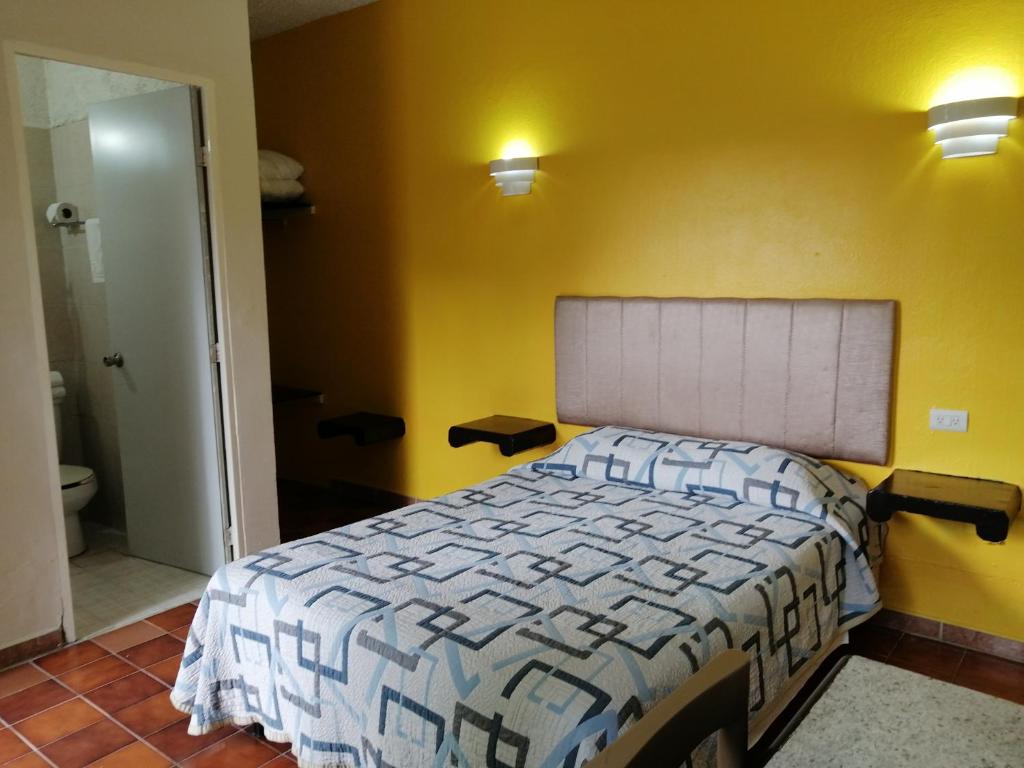 Postel nebo postele na pokoji v ubytování Hotel Tamuin