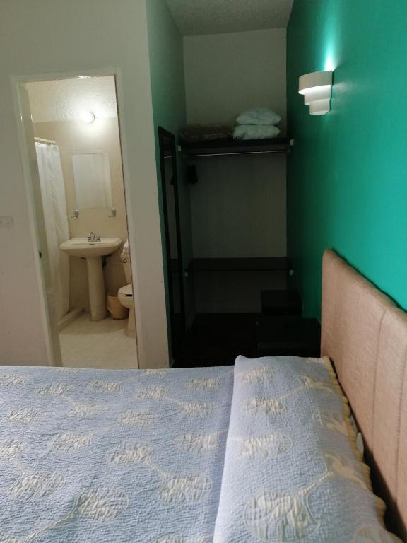 Postel nebo postele na pokoji v ubytování Hotel Tamuin