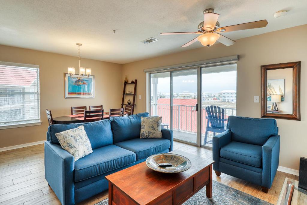 a living room with a couch and chairs and a table at Navarre Beach Sunset Condo in Navarre