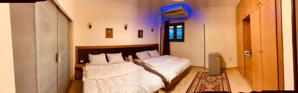 Postel nebo postele na pokoji v ubytování Draz pyramids view Bed & breakfast