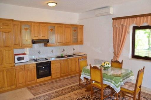 Kuchyň nebo kuchyňský kout v ubytování Apartment Knez