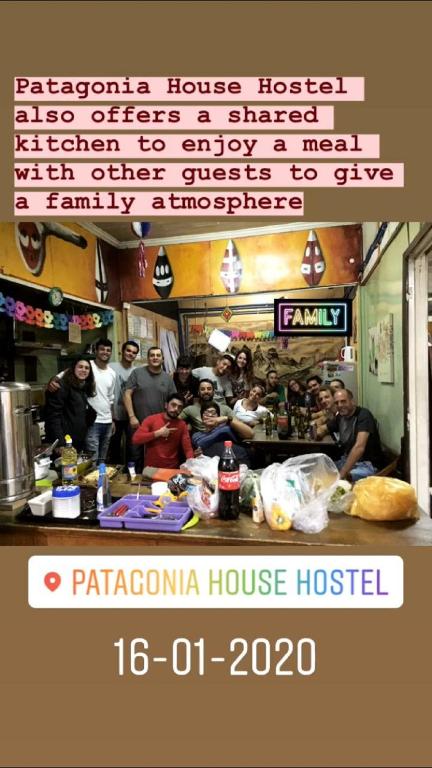 a group of people in a kitchen preparing food at Patagonia House in Punta Arenas