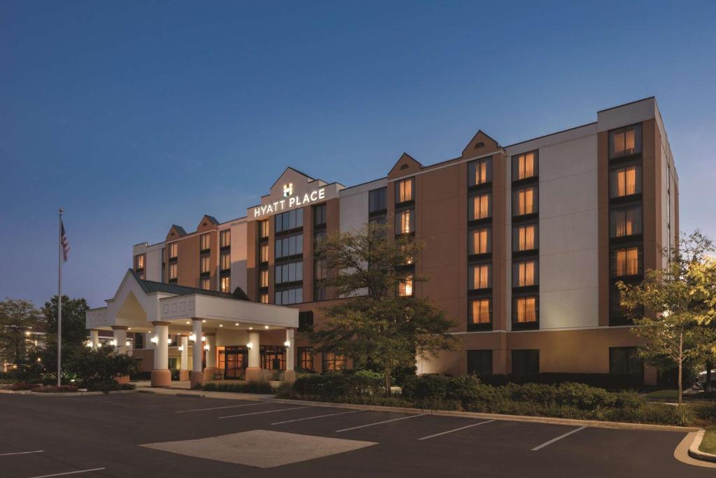 a rendering of a hotel with a parking lot at Hyatt Place Chicago Hoffman Estates in Hoffman Estates