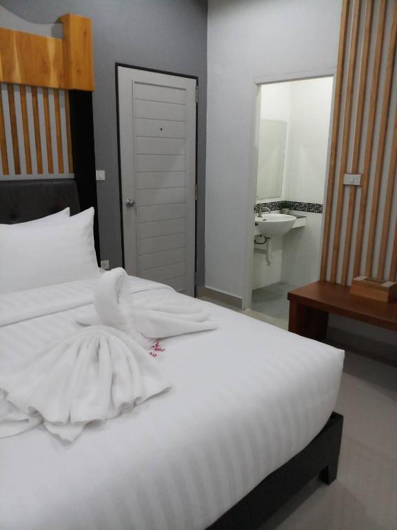 Postel nebo postele na pokoji v ubytování Origin hua hin poolvilla
