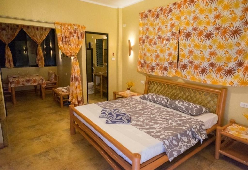 Postel nebo postele na pokoji v ubytování Sun House Rental