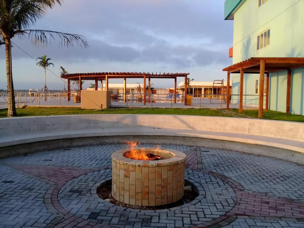  Flat com praia privativa e lazer total em Arraial