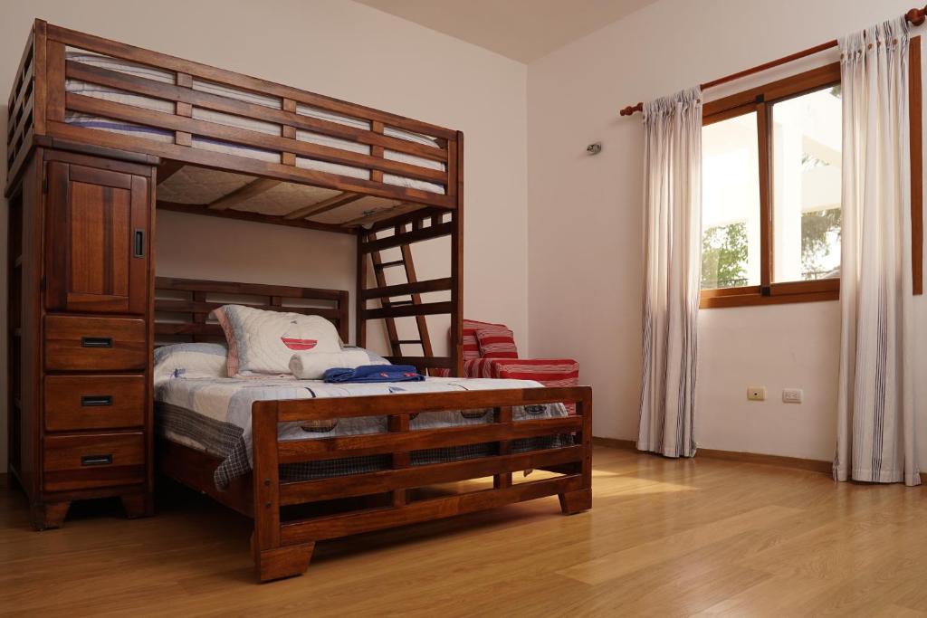 Postel nebo postele na pokoji v ubytování Sybaris Suites & Residences