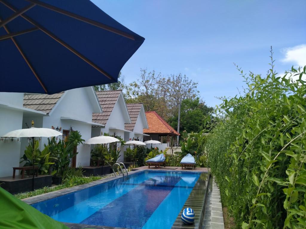 Bazén v ubytování PITAMATA VILLAS nebo v jeho okolí
