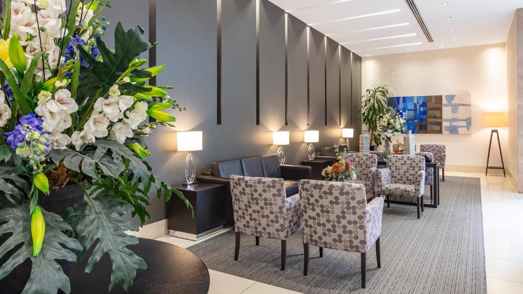 Posezení v ubytování Oaks Brisbane on Charlotte Suites