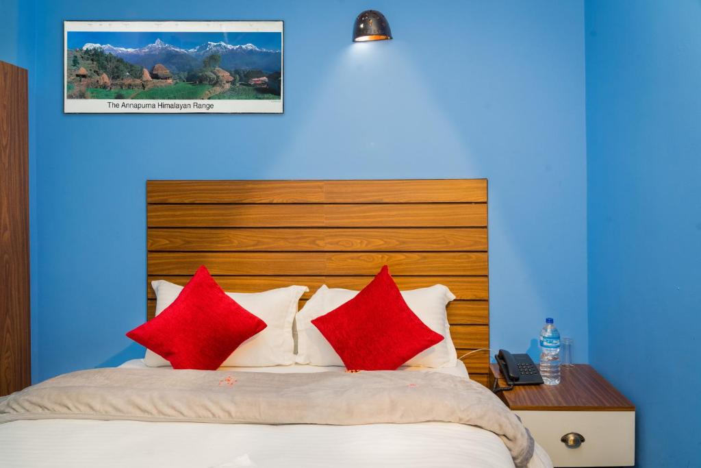 Postel nebo postele na pokoji v ubytování Hotel Nepal Bhumi