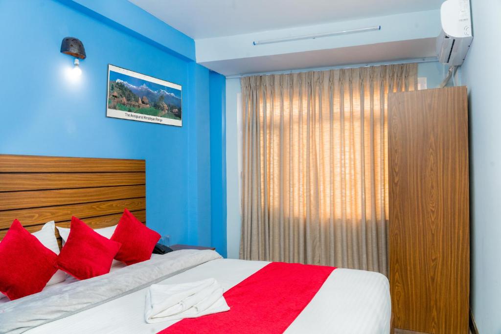 Postel nebo postele na pokoji v ubytování Hotel Nepal Bhumi