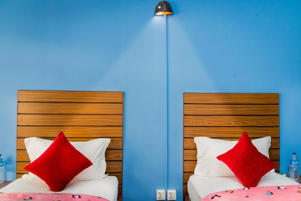 Postel nebo postele na pokoji v ubytování Hotel Nepal Bhumi