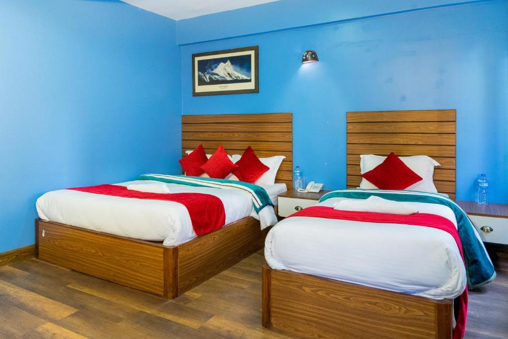 Postel nebo postele na pokoji v ubytování Hotel Nepal Bhumi