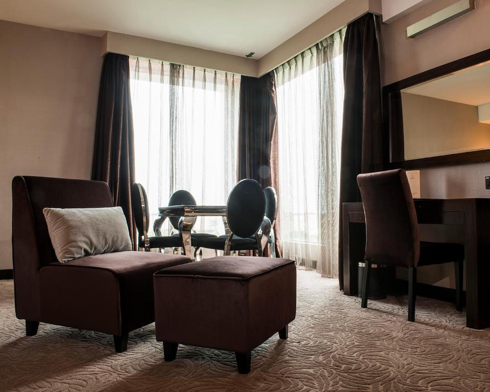 Royale Signature Hotel - Suite Familiar