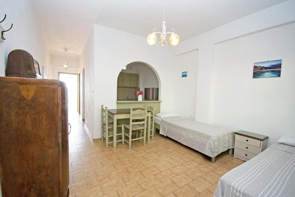 A bed or beds in a room at Panorama Apartments