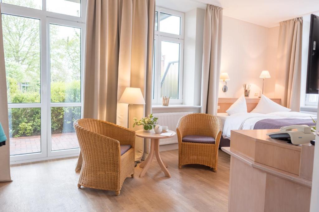 Postel nebo postele na pokoji v ubytování BE BIO Hotel be active - Nähe historischer Hafen