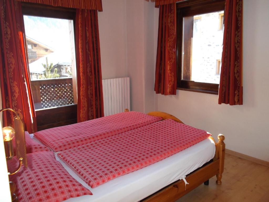Postel nebo postele na pokoji v ubytování Hotel Adele