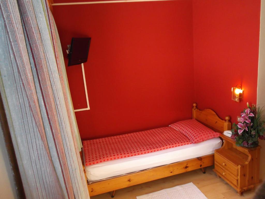 Postel nebo postele na pokoji v ubytování Hotel Adele