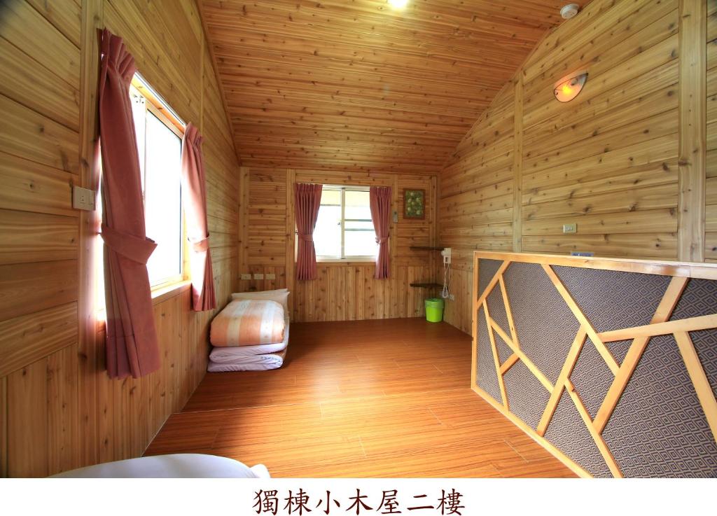 Postel nebo postele na pokoji v ubytování Yi Xin Homestay