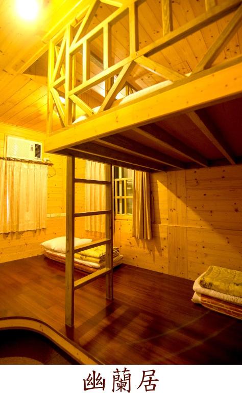 Postel nebo postele na pokoji v ubytování Yi Xin Homestay