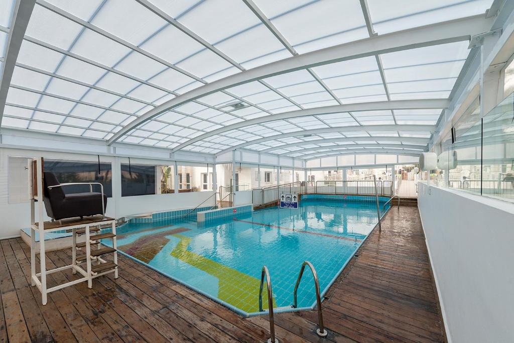 Bazén v ubytování Hotel Astral Nirvana Club- Half Board nebo v jeho okolí